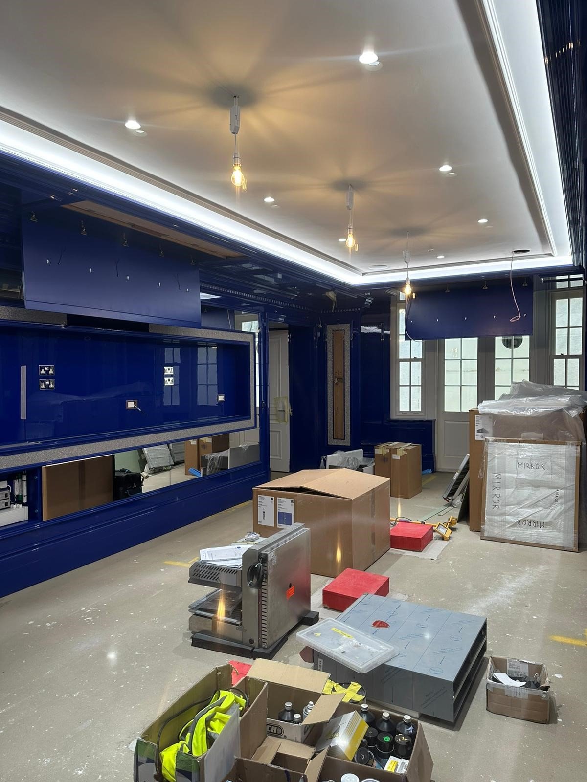Certified domestic electrician completing dining room electrics and lighting