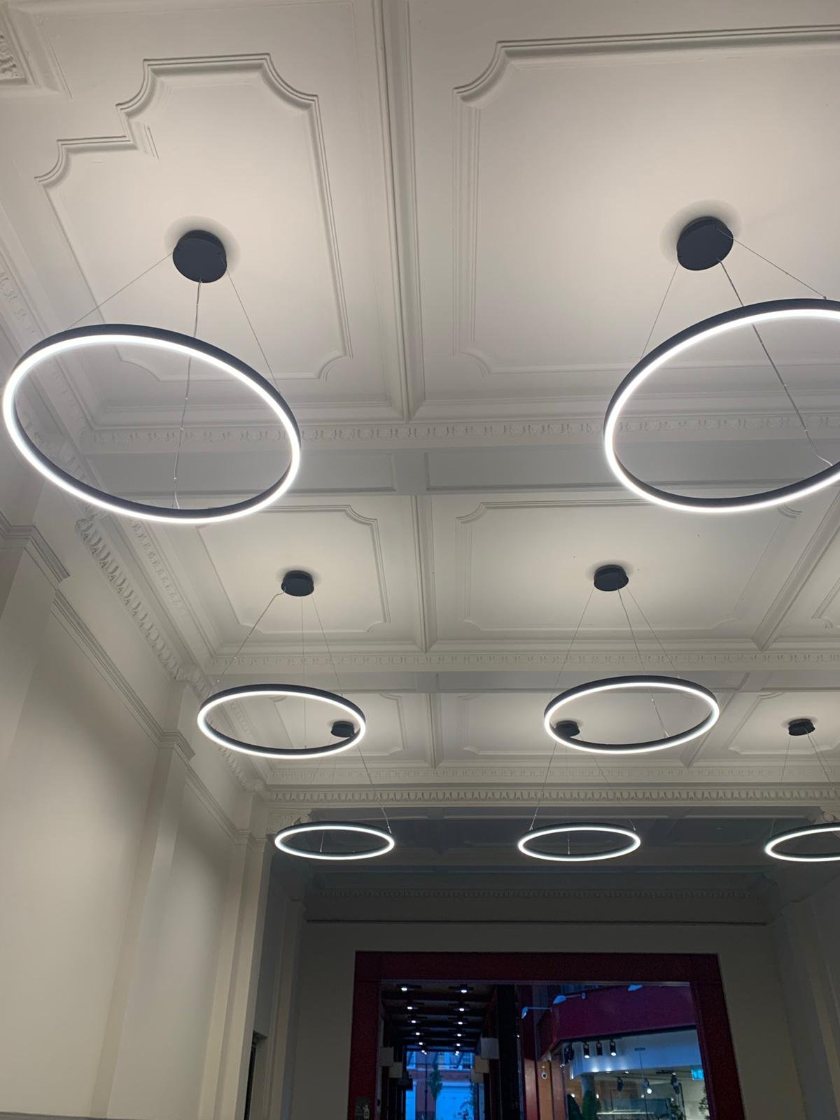 Domestic electrician North London installing lighting in a home
